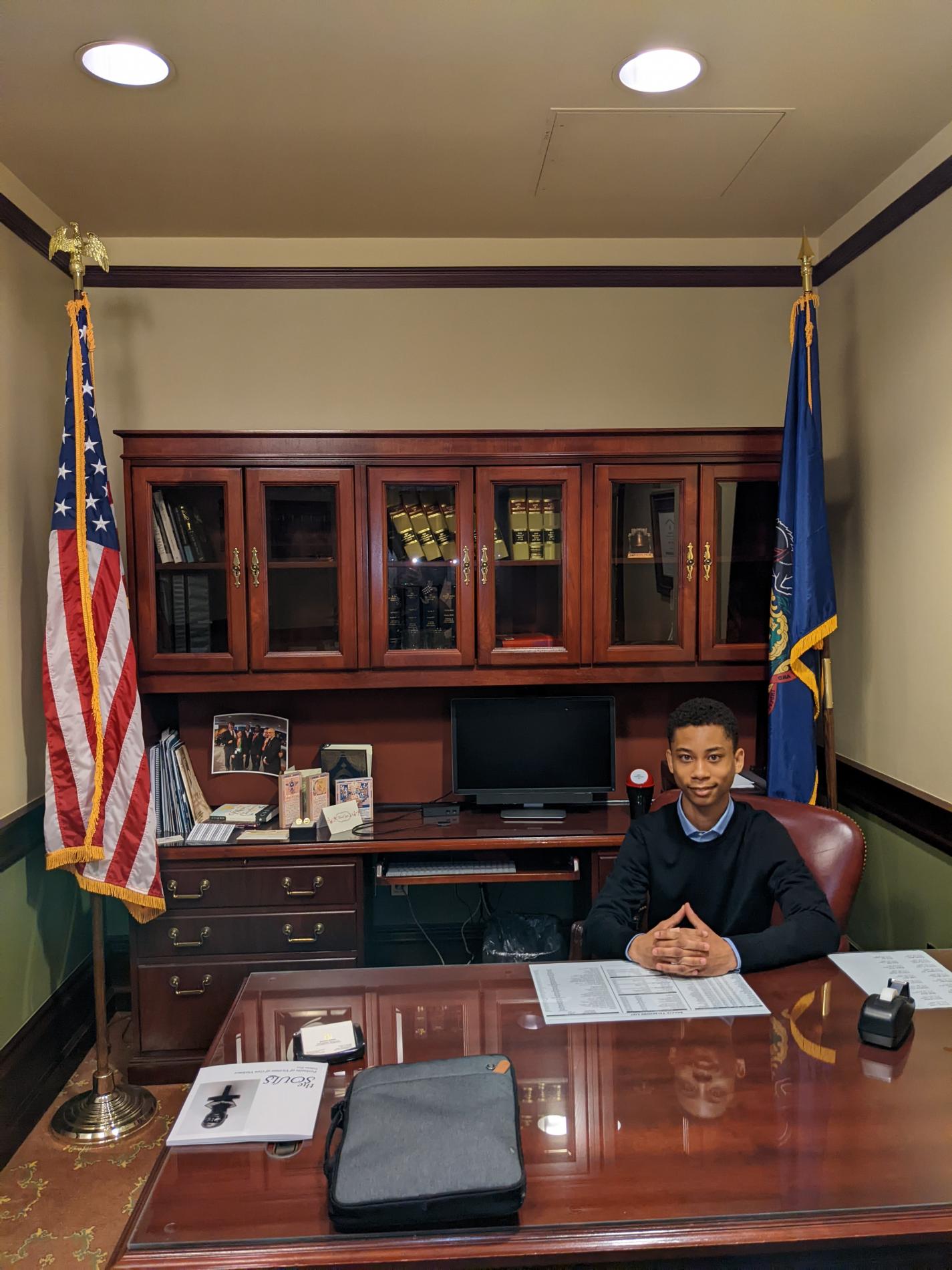 Nate sitting at a desk in Harrisburg