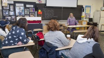 Teacher talking to a classroom