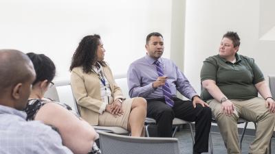 Panelist speaks to audience.