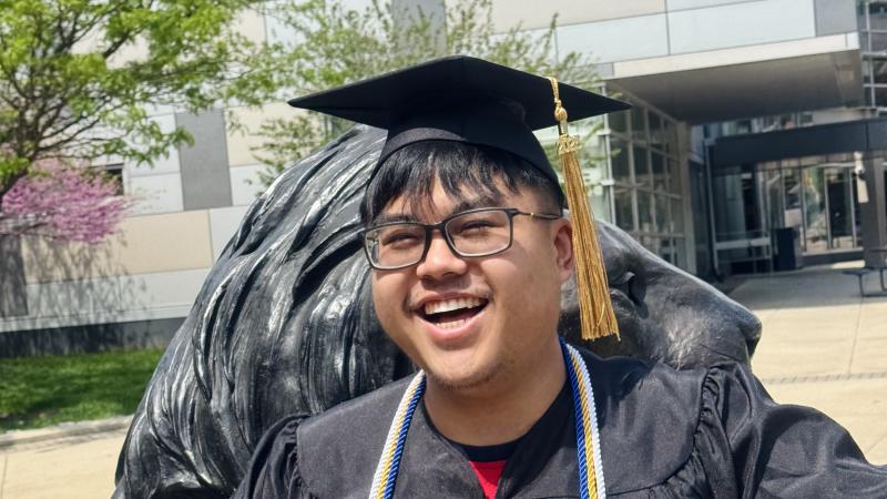 Debt free student david hansen smiling