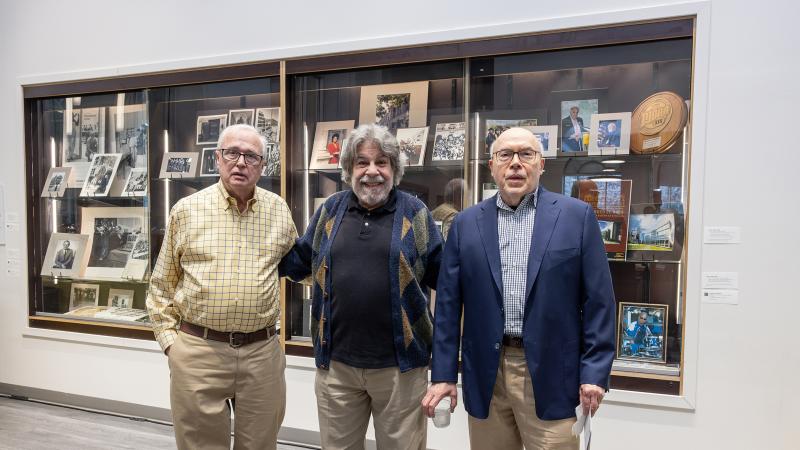 three alumni who visited the exhibit 