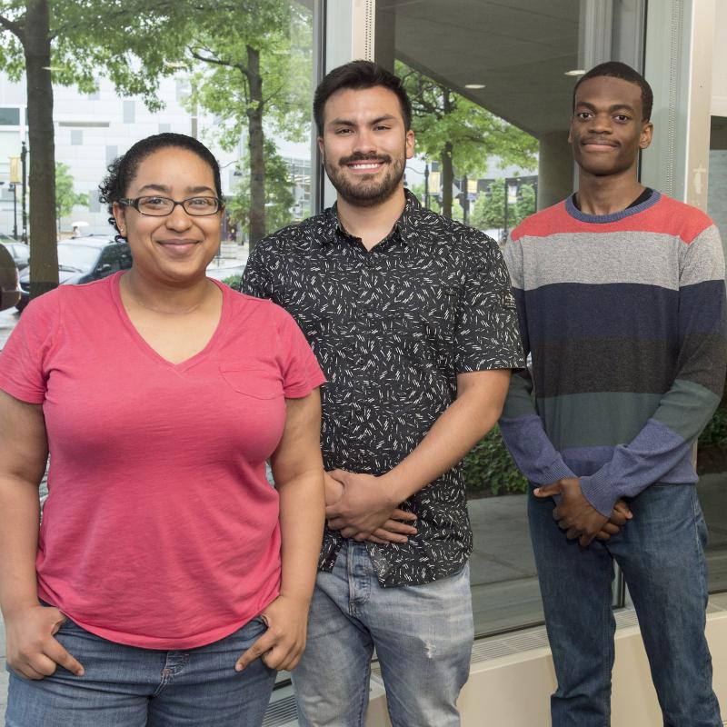 Three student scholars pose for the camera.