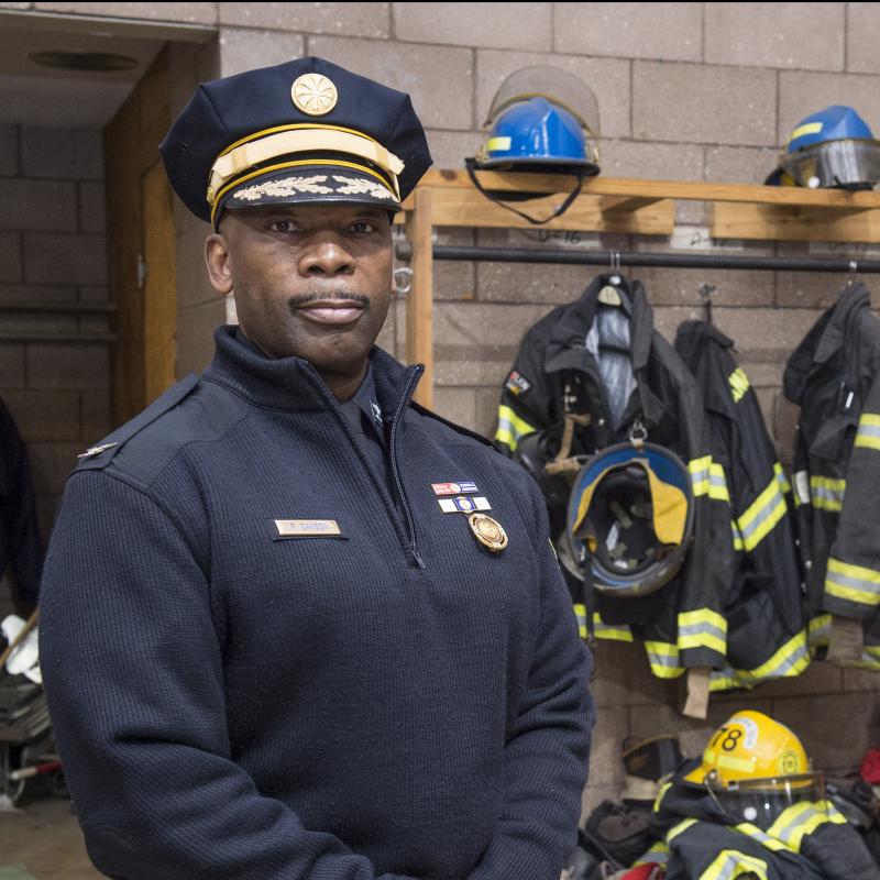 Fireman poses for the camera.