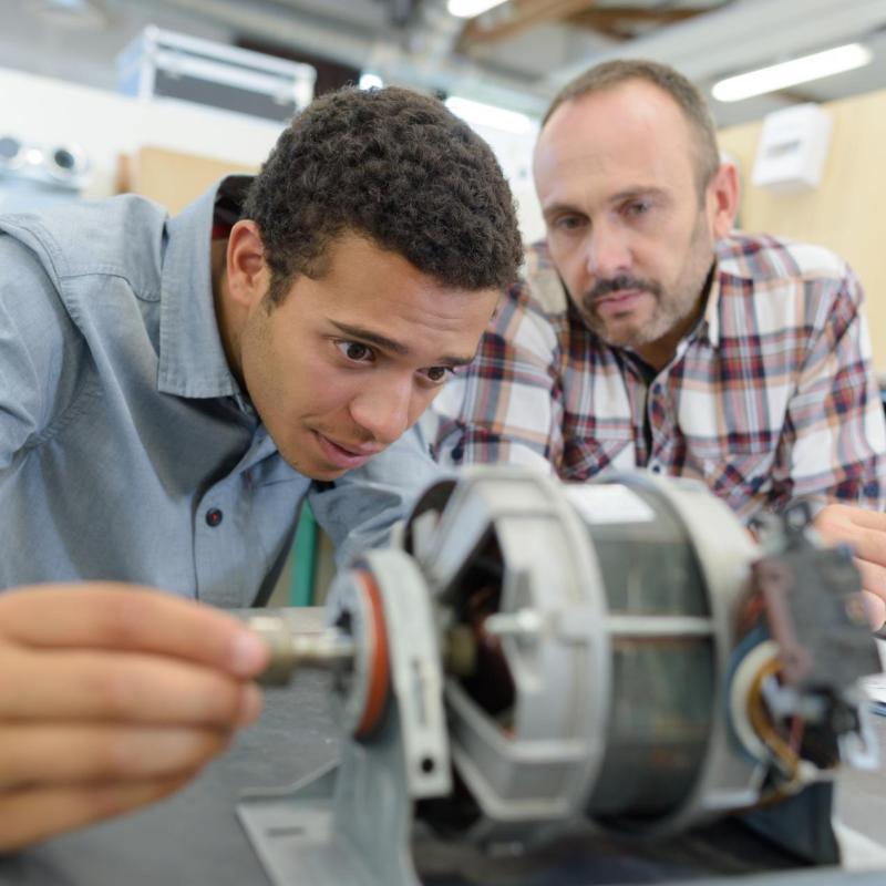 Student working on an electric motor