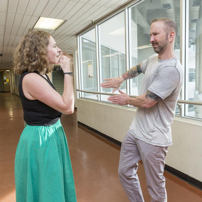 two people communicating via ASL