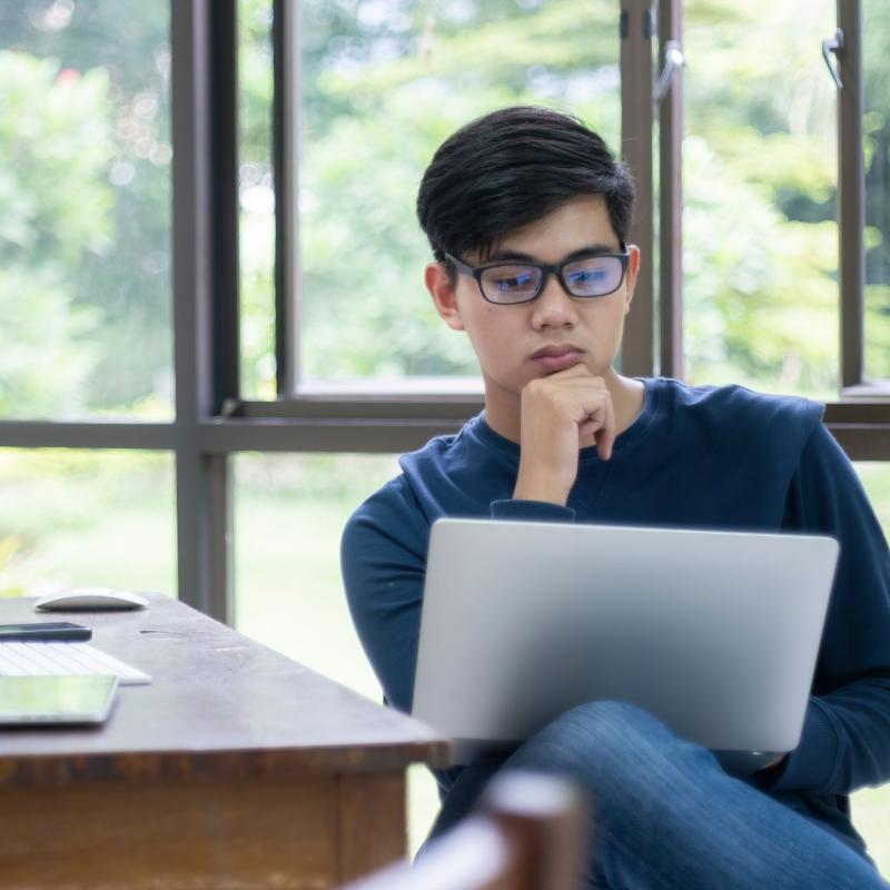 Person working on their laptop