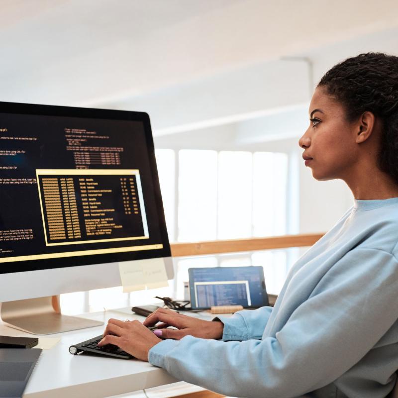 Person coding at their desk