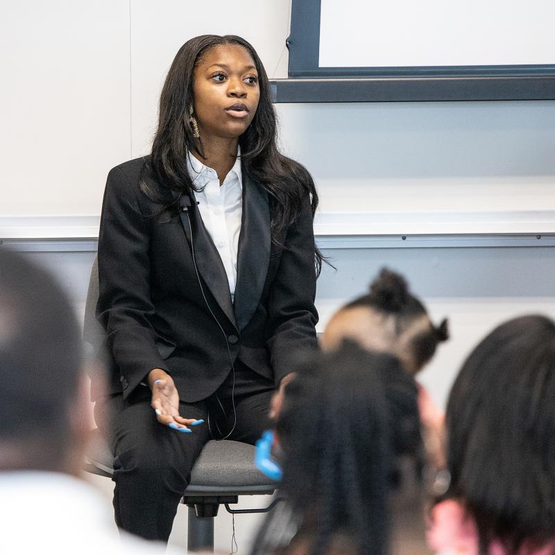 Person speaking to a classroom