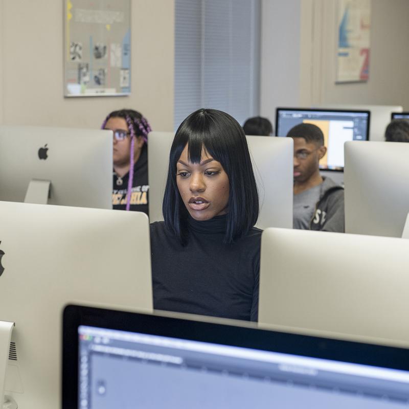 Student editing in a computer lab