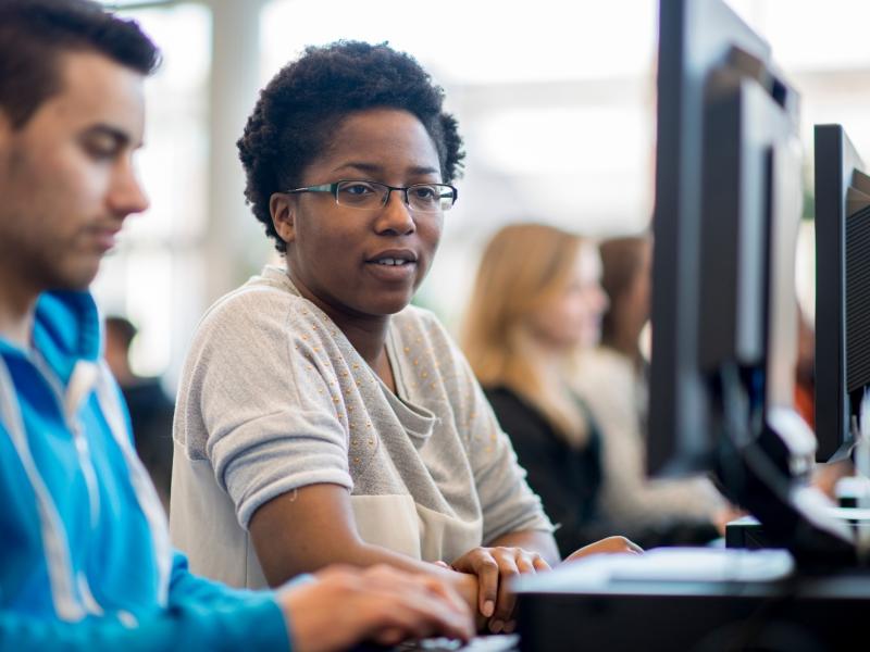 Students working in a computer lab.