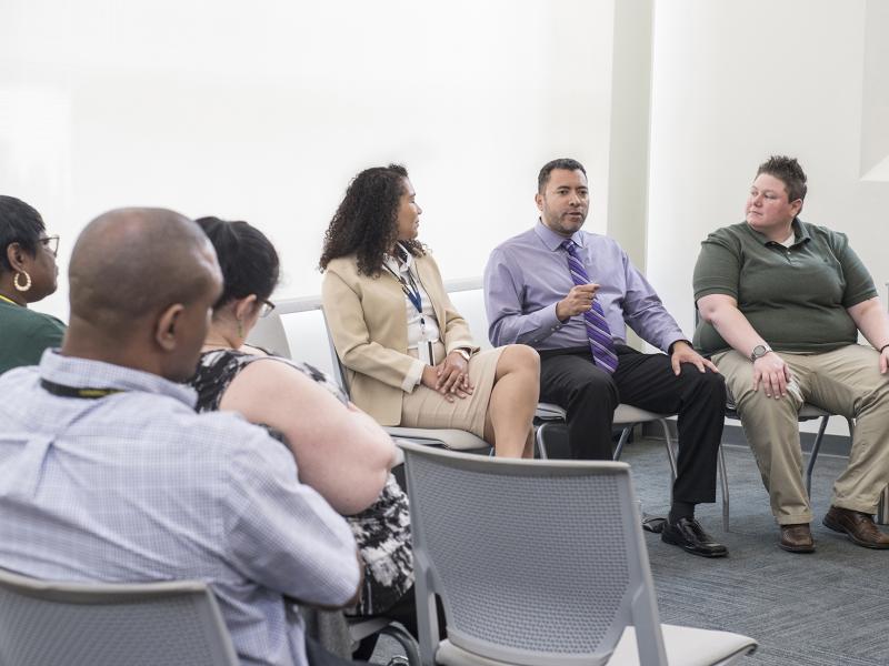 Panelist speaks to audience.