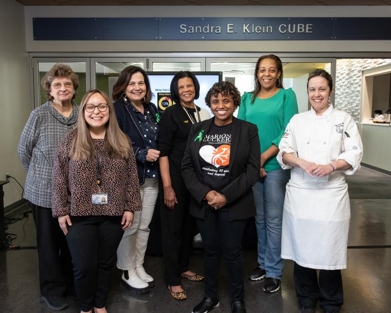 Staff smiling at the Camera