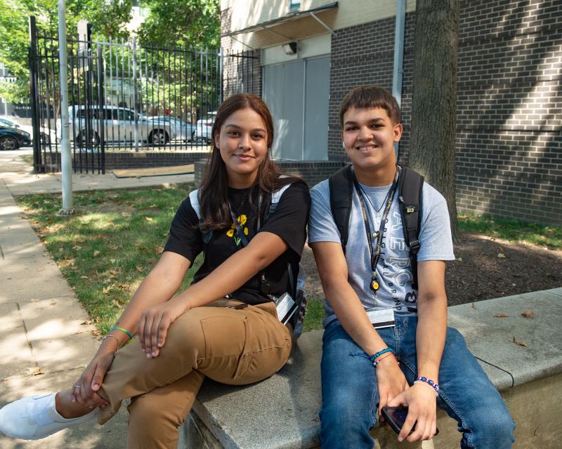students at the college sitting outside in the winnet courtyard 