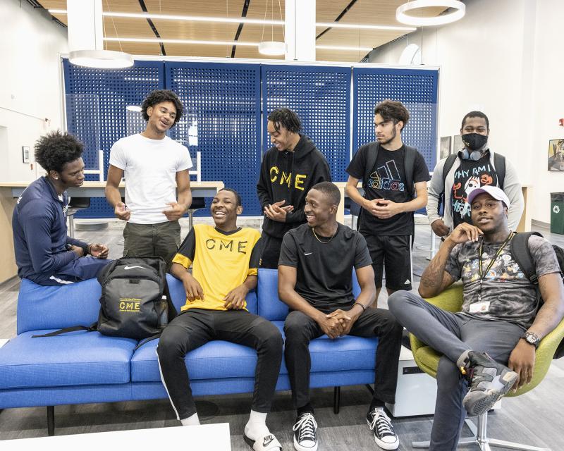 Eight Male students who are a part of the Center for Male Engagment 