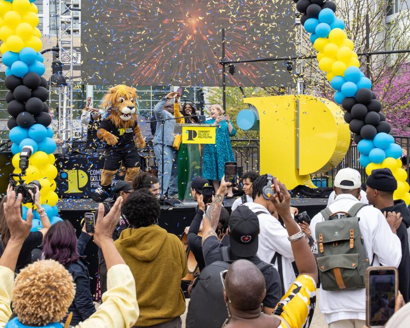 Mascot Roary and students and staff at CCP celebrating the brand launch
